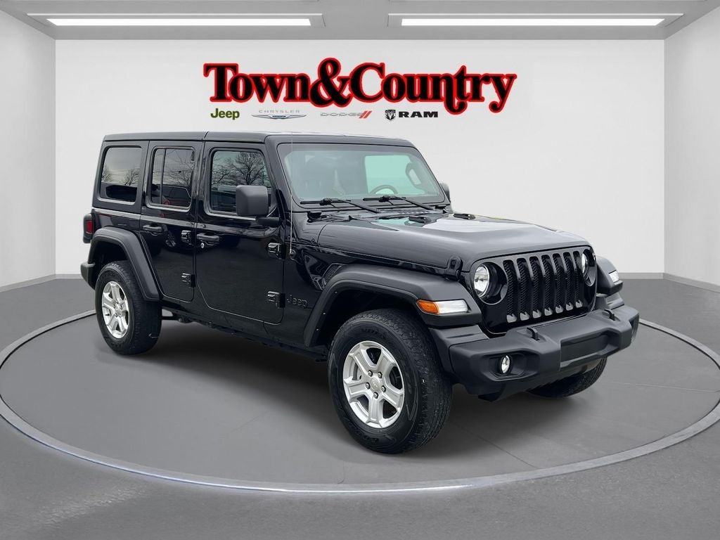 2022 Jeep Wrangler Unlimited Sport S in Black Clearcoat — front three-quarter view
