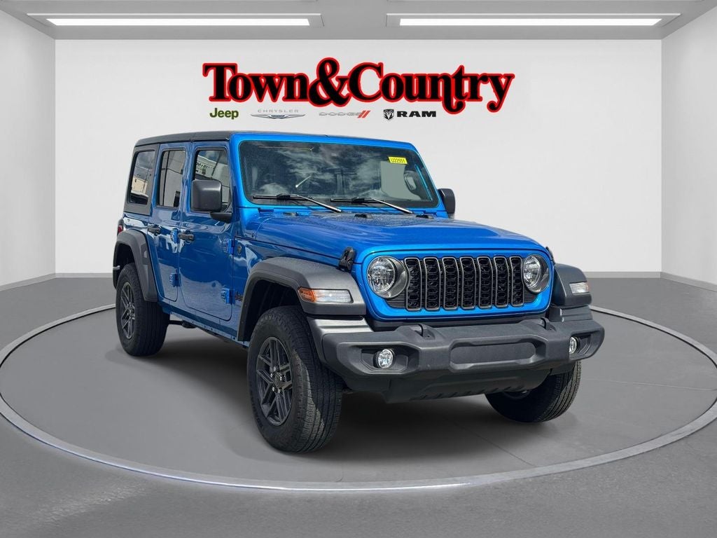 2024 Jeep Wrangler Sport S in Hydro Blue Pearl Coat — front three-quarter view