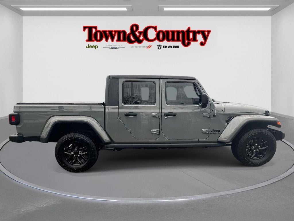 2022 Jeep Gladiator Sport in Sting-Gray Clearcoat — front three-quarter view