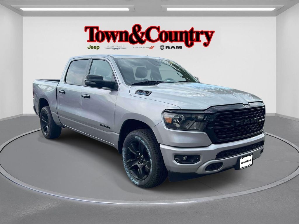 2023 RAM 1500 Big Horn Crew Cab 4x4 5'7' Box in Billet Silver Metallic Clearcoat — front three-quarter view