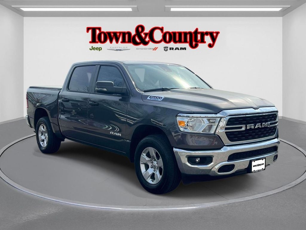 2023 RAM 1500 Big Horn Crew Cab 4x4 5'7' Box in Granite Crystal Metallic Clearcoat — front three-quarter view