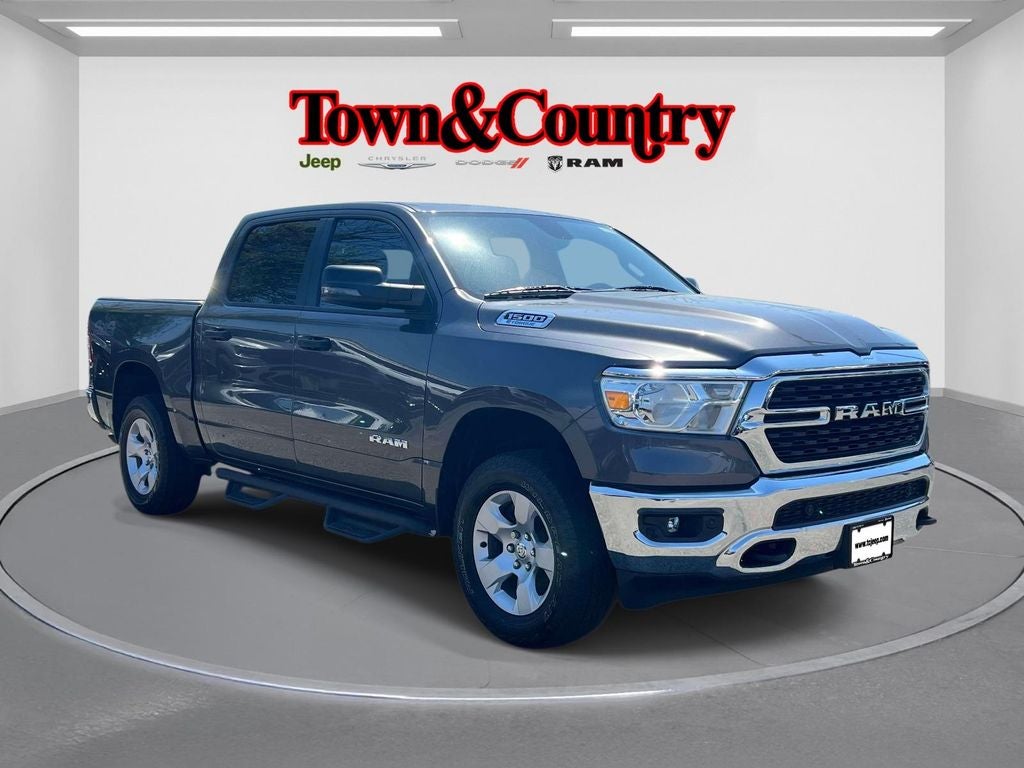 2023 RAM 1500 Big Horn Crew Cab 4x4 5'7' Box in Granite Crystal Metallic Clearcoat — front three-quarter view