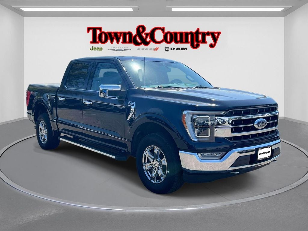 2021 Ford F-150 LARIAT in Blue — front three-quarter view